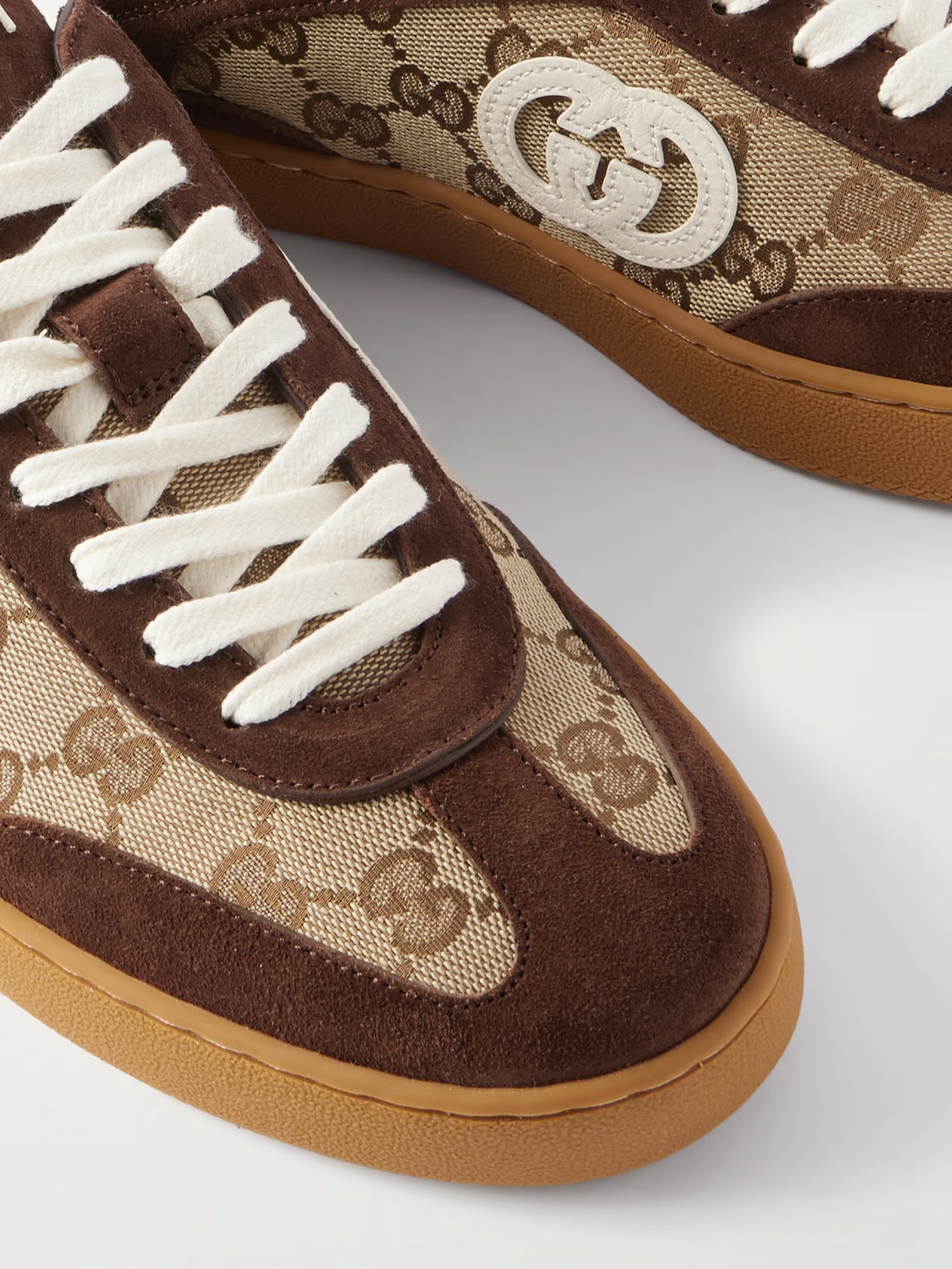 GUCCI Ace sneakers in canvas with logo pattern, leather trim and woven ribbon